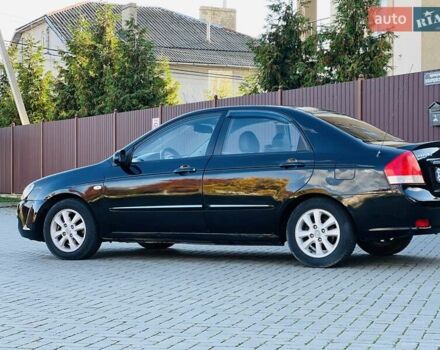 Черный Киа Черато, объемом двигателя 1.6 л и пробегом 210 тыс. км за 3650 $, фото 11 на Automoto.ua