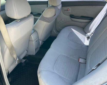 Черный Киа Черато, объемом двигателя 1.59 л и пробегом 210 тыс. км за 4100 $, фото 15 на Automoto.ua