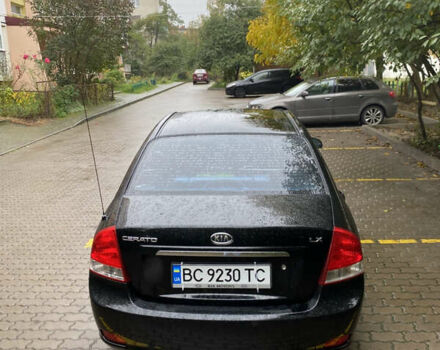 Чорний Кіа Черато, об'ємом двигуна 1.59 л та пробігом 232 тис. км за 4000 $, фото 5 на Automoto.ua