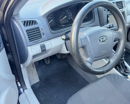 Чорний Кіа Черато, об'ємом двигуна 1.59 л та пробігом 250 тис. км за 4300 $, фото 17 на Automoto.ua