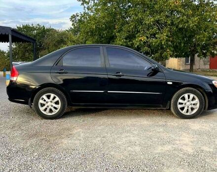 Черный Киа Черато, объемом двигателя 2 л и пробегом 186 тыс. км за 5300 $, фото 3 на Automoto.ua