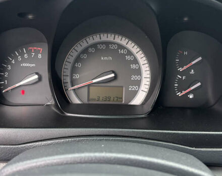 Черный Киа Черато, объемом двигателя 1.59 л и пробегом 314 тыс. км за 5000 $, фото 8 на Automoto.ua