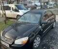 Черный Киа Черато, объемом двигателя 1.59 л и пробегом 250 тыс. км за 3200 $, фото 1 на Automoto.ua
