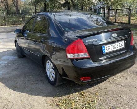 Чорний Кіа Черато, об'ємом двигуна 1.6 л та пробігом 157 тис. км за 5800 $, фото 4 на Automoto.ua