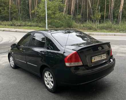 Черный Киа Черато, объемом двигателя 1.6 л и пробегом 211 тыс. км за 3200 $, фото 2 на Automoto.ua