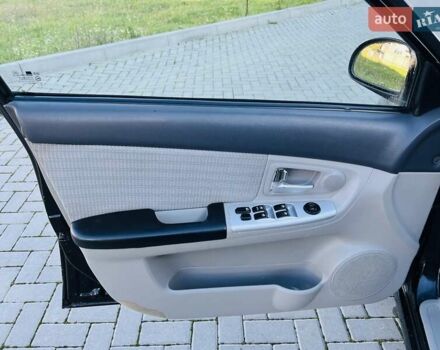 Черный Киа Черато, объемом двигателя 1.6 л и пробегом 210 тыс. км за 3750 $, фото 30 на Automoto.ua