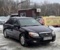 Черный Киа Черато, объемом двигателя 2 л и пробегом 174 тыс. км за 4999 $, фото 1 на Automoto.ua