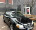 Черный Киа Черато, объемом двигателя 1.6 л и пробегом 256 тыс. км за 4200 $, фото 2 на Automoto.ua