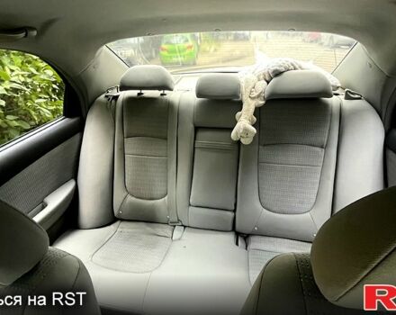 Черный Киа Черато, объемом двигателя 2 л и пробегом 163 тыс. км за 3000 $, фото 7 на Automoto.ua