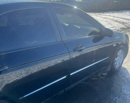 Черный Киа Черато, объемом двигателя 1.58 л и пробегом 355 тыс. км за 3500 $, фото 4 на Automoto.ua