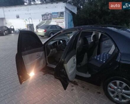 Черный Киа Черато, объемом двигателя 2 л и пробегом 340 тыс. км за 5500 $, фото 11 на Automoto.ua