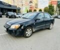 Черный Киа Черато, объемом двигателя 1.6 л и пробегом 95 тыс. км за 3300 $, фото 1 на Automoto.ua