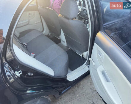 Чорний Кіа Черато, об'ємом двигуна 1.59 л та пробігом 250 тис. км за 4300 $, фото 9 на Automoto.ua