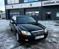 Чорний Кіа Черато, об'ємом двигуна 1.6 л та пробігом 250 тис. км за 4200 $, фото 1 на Automoto.ua