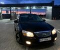 Чорний Кіа Черато, об'ємом двигуна 1.6 л та пробігом 280 тис. км за 5000 $, фото 1 на Automoto.ua