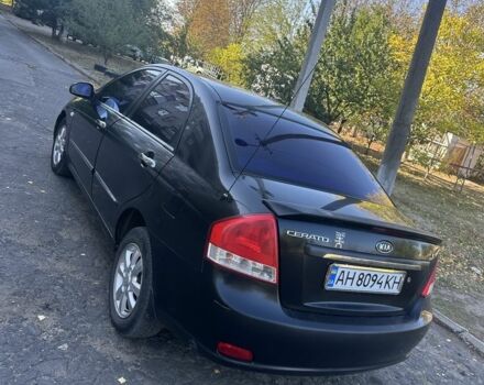 Чорний Кіа Черато, об'ємом двигуна 2 л та пробігом 310 тис. км за 3400 $, фото 4 на Automoto.ua