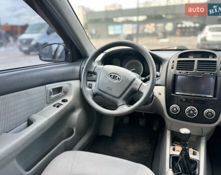 Чорний Кіа Черато, об'ємом двигуна 1.6 л та пробігом 272 тис. км за 5200 $, фото 12 на Automoto.ua