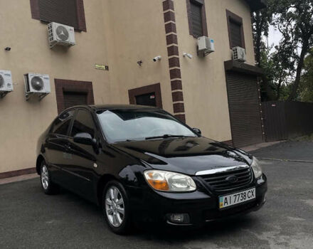 Черный Киа Черато, объемом двигателя 1.59 л и пробегом 273 тыс. км за 2999 $, фото 1 на Automoto.ua