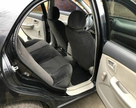 Черный Киа Черато, объемом двигателя 1.6 л и пробегом 240 тыс. км за 3300 $, фото 11 на Automoto.ua