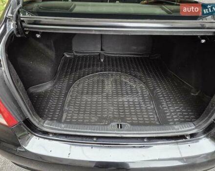 Черный Киа Черато, объемом двигателя 1.98 л и пробегом 180 тыс. км за 4500 $, фото 15 на Automoto.ua