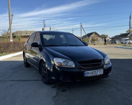 Чорний Кіа Черато, об'ємом двигуна 2 л та пробігом 362 тис. км за 3900 $, фото 3 на Automoto.ua