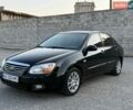 Черный Киа Черато, объемом двигателя 1.98 л и пробегом 194 тыс. км за 4600 $, фото 1 на Automoto.ua