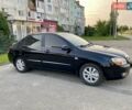 Чорний Кіа Черато, об'ємом двигуна 1.6 л та пробігом 111 тис. км за 4200 $, фото 1 на Automoto.ua