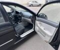 Чорний Кіа Черато, об'ємом двигуна 1.6 л та пробігом 184 тис. км за 4650 $, фото 7 на Automoto.ua