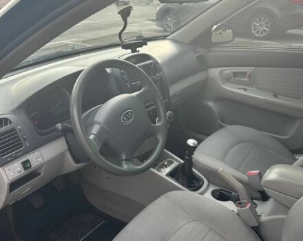 Черный Киа Черато, объемом двигателя 1.6 л и пробегом 292 тыс. км за 4000 $, фото 6 на Automoto.ua