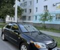 Черный Киа Черато, объемом двигателя 1.6 л и пробегом 121 тыс. км за 5594 $, фото 1 на Automoto.ua