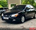 Киа Черато 2007 в Днепре (Днепропетровске) на Automoto.ua Черный Киа Черато, объемом двигателя 2 л и пробегом 155 тыс. км за 5100 $, фото 1 на Automoto.ua