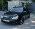 Чорний Кіа Черато, об'ємом двигуна 1.6 л та пробігом 127 тис. км за 2999 $, фото 1 на Automoto.ua