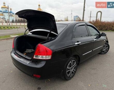 Чорний Кіа Черато, об'ємом двигуна 1.6 л та пробігом 224 тис. км за 4900 $, фото 29 на Automoto.ua
