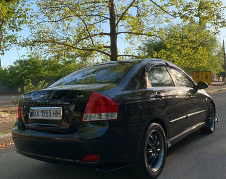 Чорний Кіа Черато, об'ємом двигуна 1.6 л та пробігом 140 тис. км за 5800 $, фото 9 на Automoto.ua