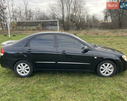 Черный Киа Черато, объемом двигателя 1.98 л и пробегом 315 тыс. км за 5745 $, фото 4 на Automoto.ua