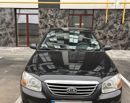 Черный Киа Черато, объемом двигателя 1.6 л и пробегом 206 тыс. км за 4500 $, фото 2 на Automoto.ua
