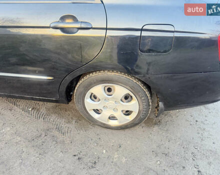 Чорний Кіа Черато, об'ємом двигуна 1.59 л та пробігом 250 тис. км за 4300 $, фото 19 на Automoto.ua