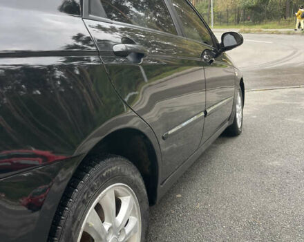 Черный Киа Черато, объемом двигателя 1.6 л и пробегом 211 тыс. км за 3200 $, фото 10 на Automoto.ua