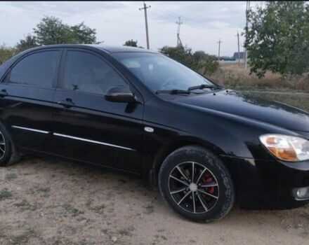 Черный Киа Черато, объемом двигателя 2 л и пробегом 290 тыс. км за 3600 $, фото 1 на Automoto.ua