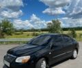 Черный Киа Черато, объемом двигателя 1.6 л и пробегом 280 тыс. км за 4500 $, фото 1 на Automoto.ua
