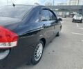 Черный Киа Черато, объемом двигателя 1.6 л и пробегом 272 тыс. км за 5200 $, фото 2 на Automoto.ua