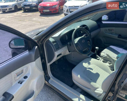 Черный Киа Черато, объемом двигателя 1.59 л и пробегом 210 тыс. км за 4100 $, фото 9 на Automoto.ua