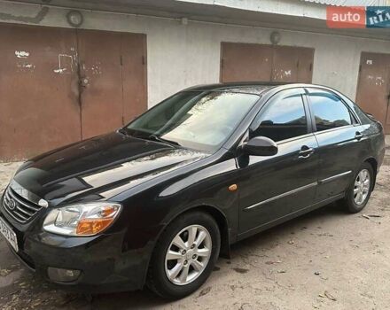 Черный Киа Черато, объемом двигателя 1.6 л и пробегом 230 тыс. км за 4950 $, фото 1 на Automoto.ua