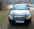Чорний Кіа Черато, об'ємом двигуна 1.6 л та пробігом 215 тис. км за 3900 $, фото 1 на Automoto.ua