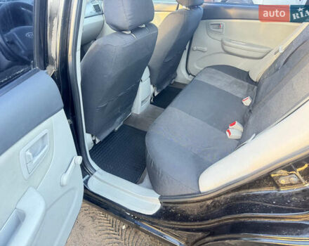 Чорний Кіа Черато, об'ємом двигуна 1.59 л та пробігом 250 тис. км за 4300 $, фото 10 на Automoto.ua