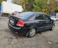 Чорний Кіа Черато, об'ємом двигуна 1.6 л та пробігом 200 тис. км за 1350 $, фото 8 на Automoto.ua