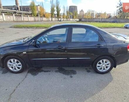 Черный Киа Черато, объемом двигателя 1.59 л и пробегом 349 тыс. км за 4000 $, фото 4 на Automoto.ua