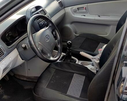 Черный Киа Черато, объемом двигателя 1.6 л и пробегом 210 тыс. км за 4000 $, фото 7 на Automoto.ua