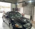 Черный Киа Черато, объемом двигателя 1.6 л и пробегом 255 тыс. км за 2500 $, фото 1 на Automoto.ua