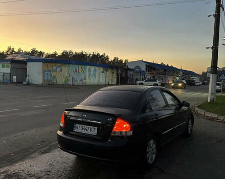 Черный Киа Черато, объемом двигателя 1.6 л и пробегом 294 тыс. км за 3500 $, фото 2 на Automoto.ua